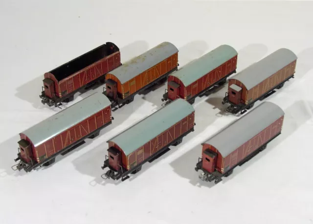 Konvolut 7 alte Trix Modell H0 Blech-Güterwagen, geschlossene Güterwagen