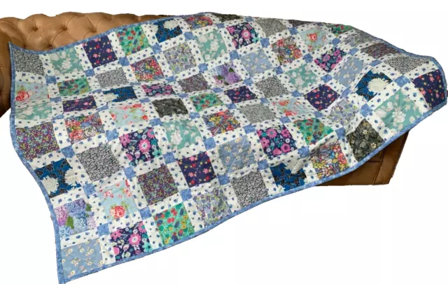 Handmade patchwork quilt or throw single blue and flowers