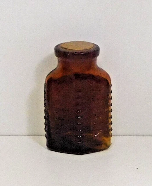 SMALL VINTAGE/ANTIQUE- POISON BOTTLE w/ LABEL  -AMBER -3 SIDED  2 3/4 ” Kv-1