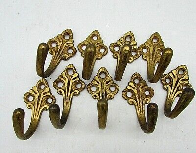 Set of Nine Antique, Brass Coat hooks, in original uncleaned condition.