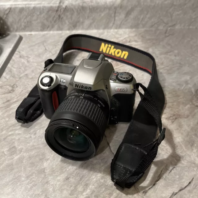 Nikon N65 35mm SLR Film Camera w/ Nikkor 28-80mm Powers On. Not Fully TESTED