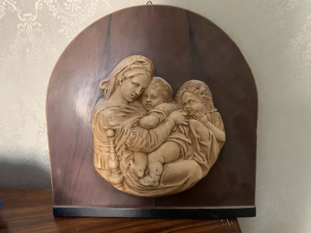 Quadro scultura in legno  “Madonna con bambino e san Giovannino”