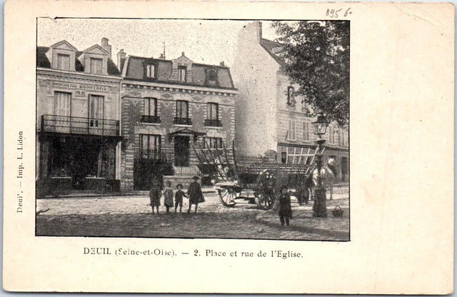 95 DEUIL - la place et la rue de l'eglise.