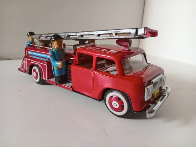 Camion de pompier à friction avec sirène » en métal rouge