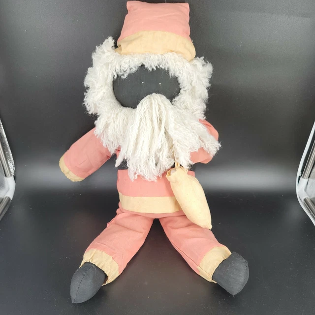 Very Old Primitive Rag Doll Santa.  Sitting 13", overall length 22". Christmas