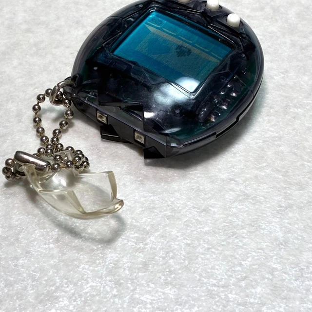 Transpadent BANDAI TAMAGOTCHI OSUCCHI noir transparent maintenu testé EUR 49,54 ...