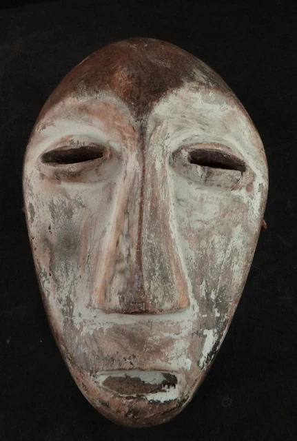 Old African Lega Carved Wood Child’s Mask with White Slip. 1st ½ 20th, 6”x 4”