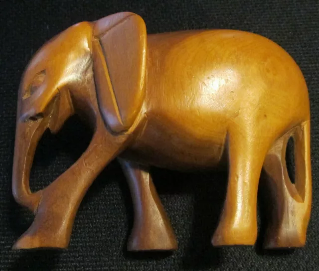 VINTAGE VARIEGATED COLOR WOODEN CARVED ELEPHANT FIGURE TRUNK DOWN 5" x 4"