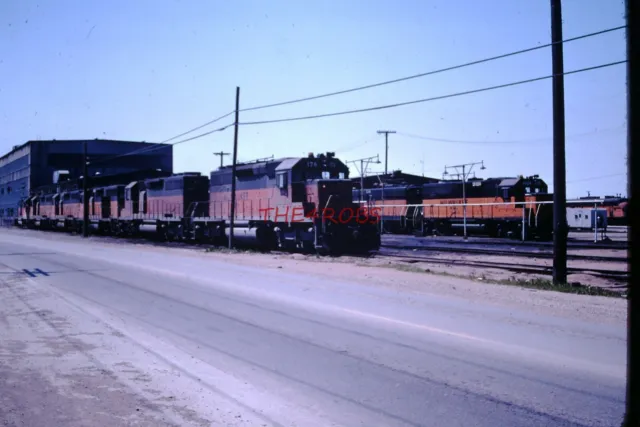 Original 1976 Milwaukee Road Locomotives at Bensenville Yard Shop IL Slide #3053