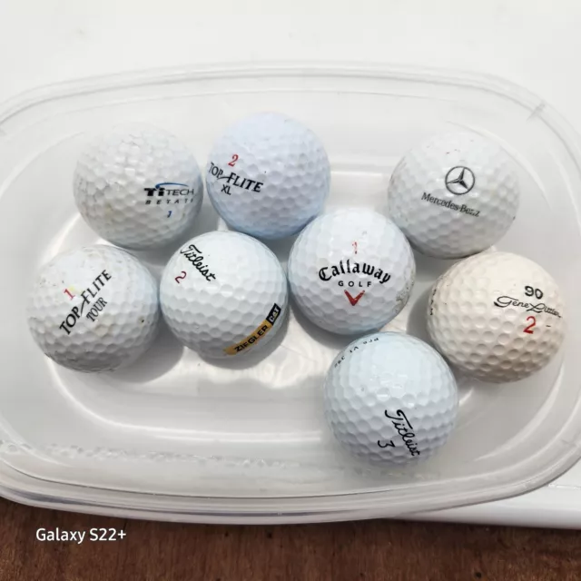 8 Used Golf Balls Titleist, Top Flite , Callaway, Mercedes Benz and others