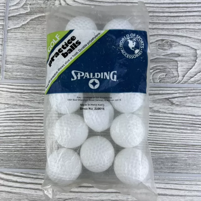Spalding - Golf Balls - Practice - Plastic - Vintage 12 Pack - White, 1 Squished