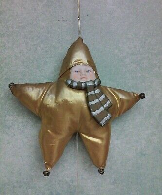 Campanas de juguete musicales de colección doradas cara de bebé peluche espeluznante estrella sonrisa de Navidad