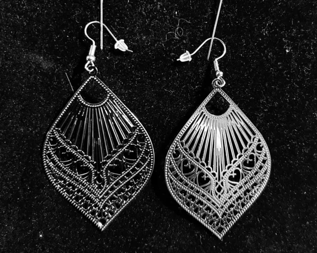 Beautiful Silver Tone Scroll Cut Earrings