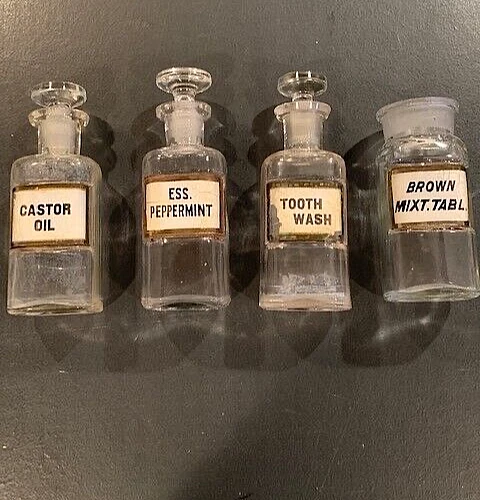 Antique Apothecary Bottles, set of four, gold trimmed labels