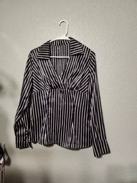 Black and white women's blouse - p2p in photos