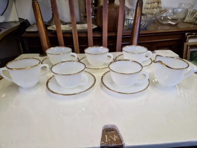 Set Of 5 Fire King Oven Ware Cups, Saucers, Cream And Sugar, Milk Glass & Gold