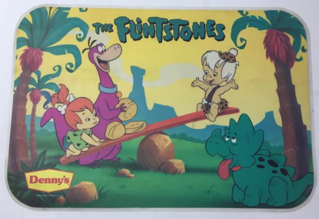 1989 Denny's laminated placemat ~ THE FLINTSTONES Pebbles+Bamm-Bamm,Dino