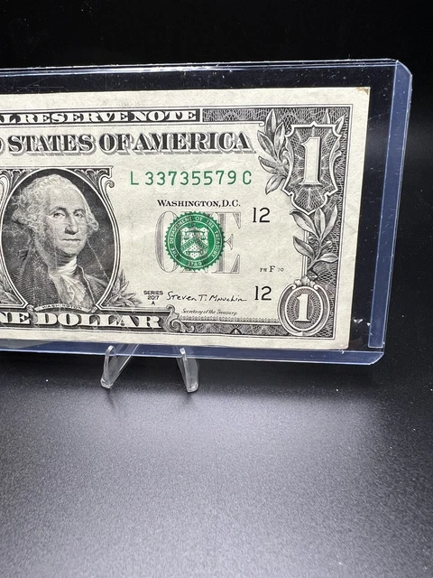 One dollar bill with VERY COOL fancy serial number  L3373 5579 C, Lot 117