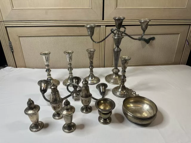 Lot Of Sterling Silver Weighted Candle Holders And Salt And Pepper Shakers