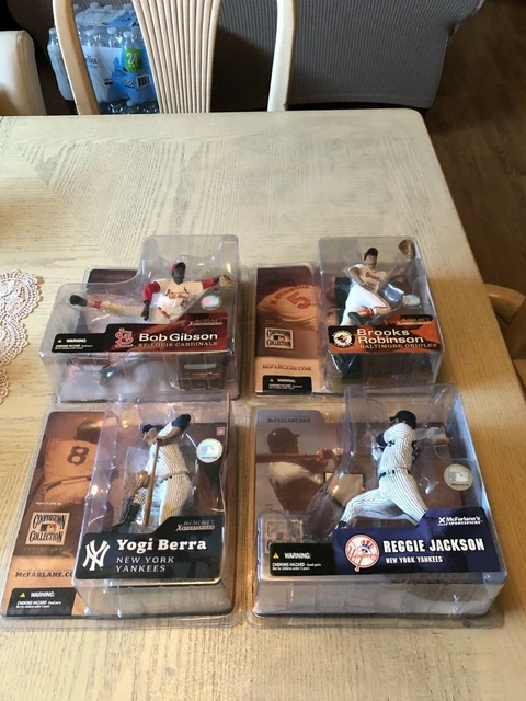 McFarlane Cooperstown Collection Berra, Reggie Jackson, B. Robinson, Gibson Lot McFarlane Cooperstown Collection Berra, Reggie Jackson, B. Robinson, Gibson Lot