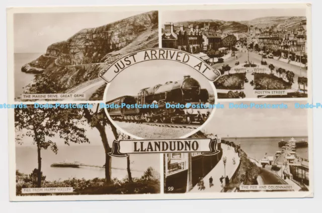 C008400 Just Arrived at Llandudno. 99. RP. 1955. Multi View