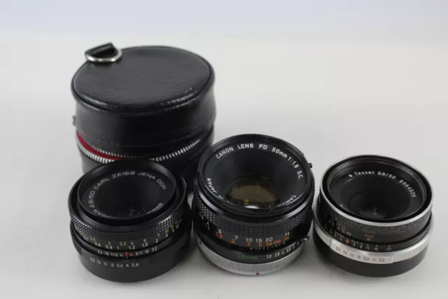 3 x CAMERA LENSES Inc. Canon & Carl Zeiss w/ Box Mechanically WORKING