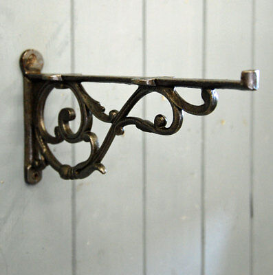 Decorative antique style lipped iron wall shelf bracket