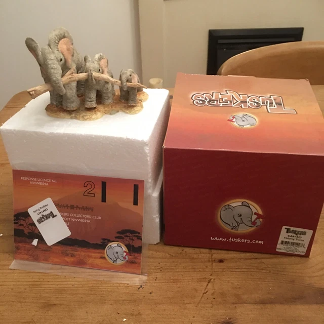 TUSKERS  trio of elephants boxed vgc “helping trunks”