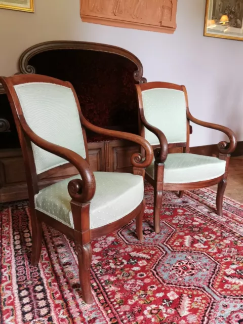 Paire de fauteuils à Crosse  en Acajou. XIX ème Siècle. Epoque Restauration.