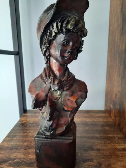 statuette en résine représentant un visage d'enfant de 20 et 25cm