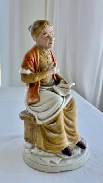 VINTAGE Ceramic Porcelain ELDERLY W0MAN ON BENCH READING BOOK Figurine Flambro