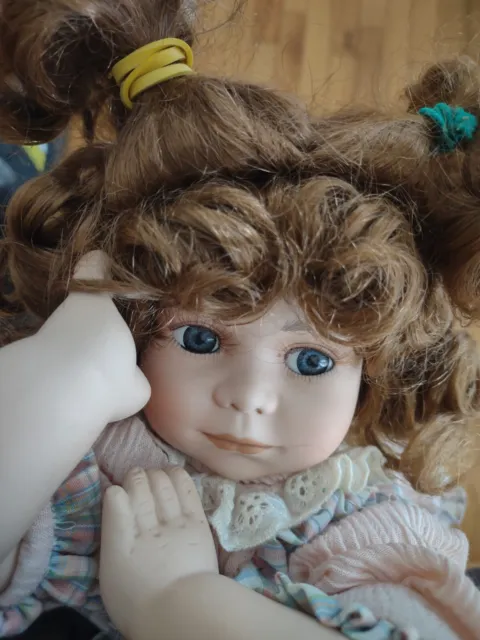 16" Porcelain Doll, Cute Little Girl Relaxing, Brown Hair Blue Eyes