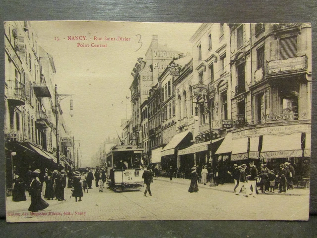 cpa 54 nancy rue saint dizier central point tram animee