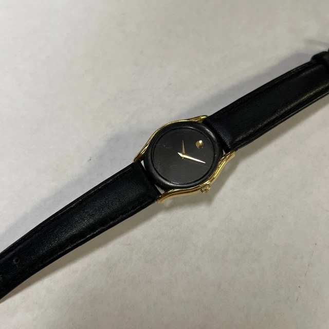 Donna Movado quadrante nero finiture oro 88-66-820N, usata batteria nuova MV66 2