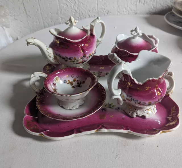 Service a Thé  Ancien Solitaire En Porcelaine Décor De Fleurs, Anglais 19 ème ?