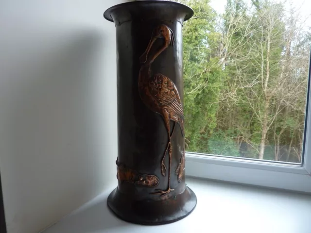 Antique Copper Stick Stand with Heron and Frog decoration.