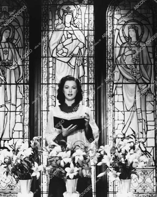 4077-001 Eleanor Powell in front stained glass windows 4077-001