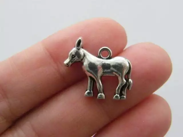 4 Donkey charms antique silver tone A606