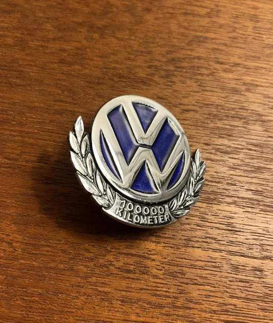 NOS VW 100000 Kilometer Plakette 1949-1953 Paulmann & Krone Brezel Käfer Emaille
