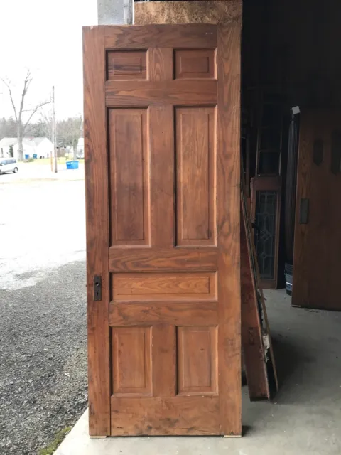 Bova 15 Antique Oak raised panel passage door 33.75 x 90 x 1.75