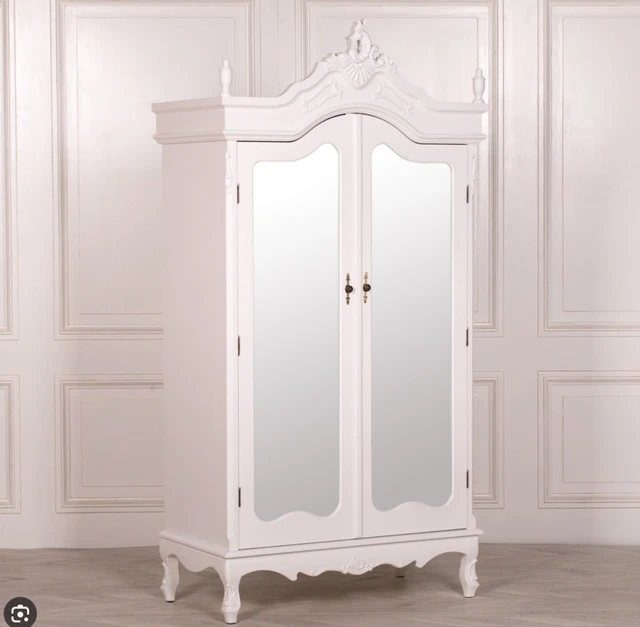 A stunning French Louis XV inspired solid Mahogany Wardrobe or Armoire