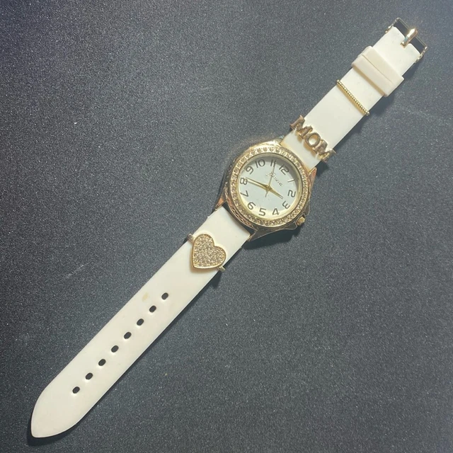 Geneva Mom/Heart Watch Pre-Owned. Gold watch with white band. Geneva Platinum Watch White Buckle Band Gold Toned  main image 2