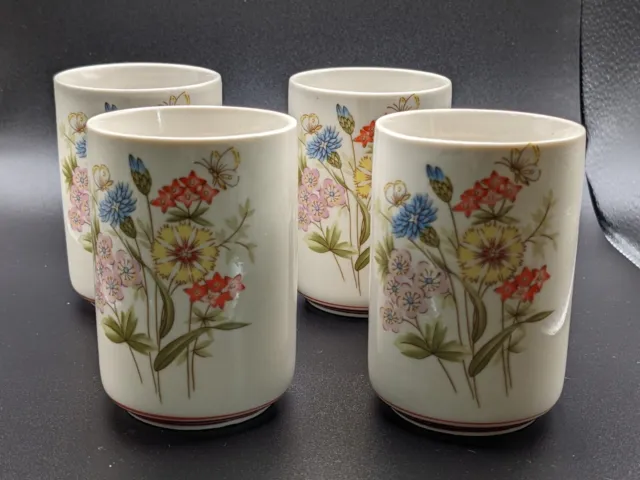 Saki or Tea cups Set of 4 Colorful Flowers Butterflies on Ivory Background 