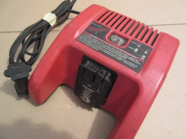 Millwaukee Rapid H. D. Battery 28 Volt With Led  Lithium  Ion Charger   #2103