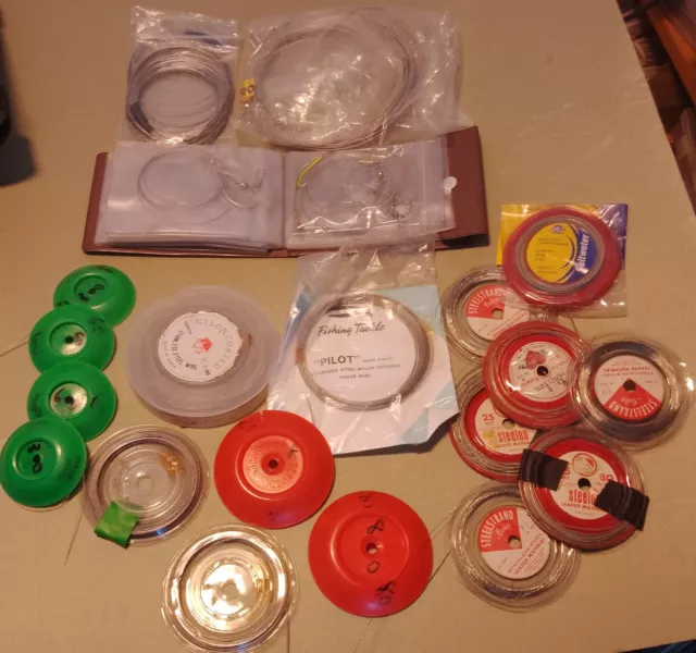 A job lot of mixed spools of stainless wire trace sea fishing + 18 traces