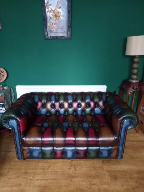 multicolour chesterfield leather sofa,exc cond,2 seater,gorgeous rich colours.