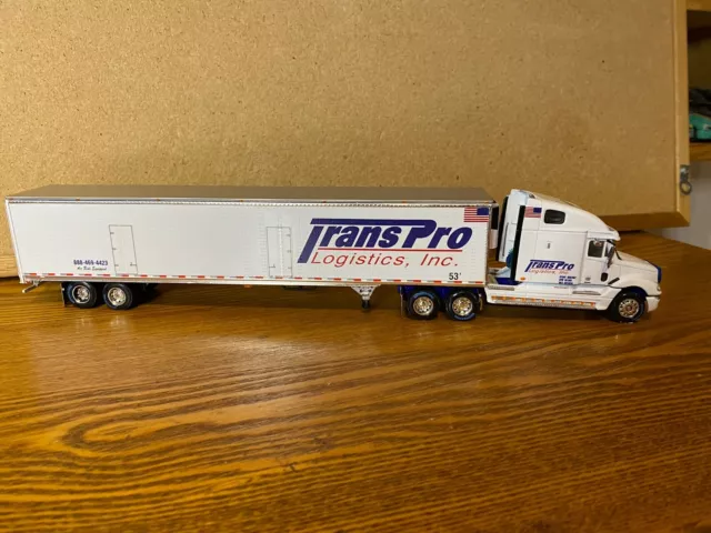 1/64 Dcp Freightliner & 53 Ft Reefer Trailer Representing “Trans Pro Logistics”