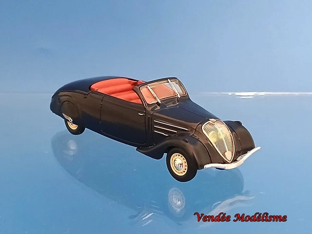 Here's a 1937 Peugeot 402 Cabriolet