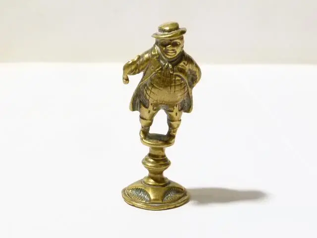 18-9thC Brass Dickens Portly Farmer Gent Holding a Pipe PIPE TAMPER