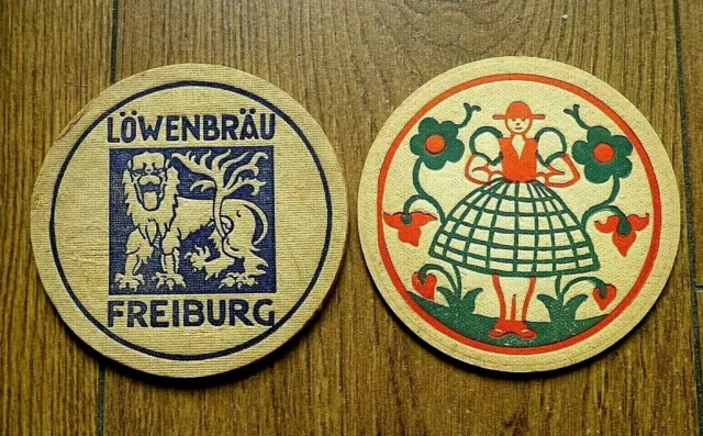 2 anciens Sous bock carton Löwenbräu Freibourg et autre 1950